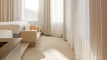 Premium bedding, down comforters, in-room safe, individually decorated