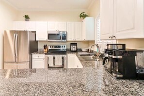 Fridge, microwave, oven, stovetop - Spacious 3-bedroom Condo with view of stream and golf course. (Myrtle Beach)