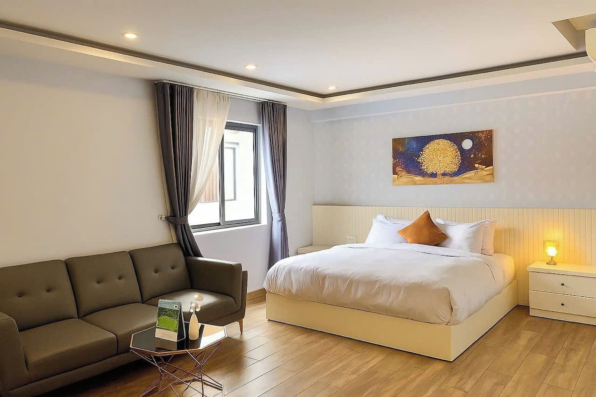Luxe kamer | Luxe beddengoed, een minibar met enkele gratis items