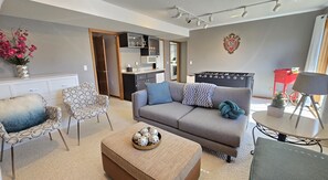 Smart TV, fireplace, table football, books