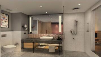 Habitación Deluxe, 1 cama doble | Baño | Secador de pelo, toallas, champú y papel higiénico