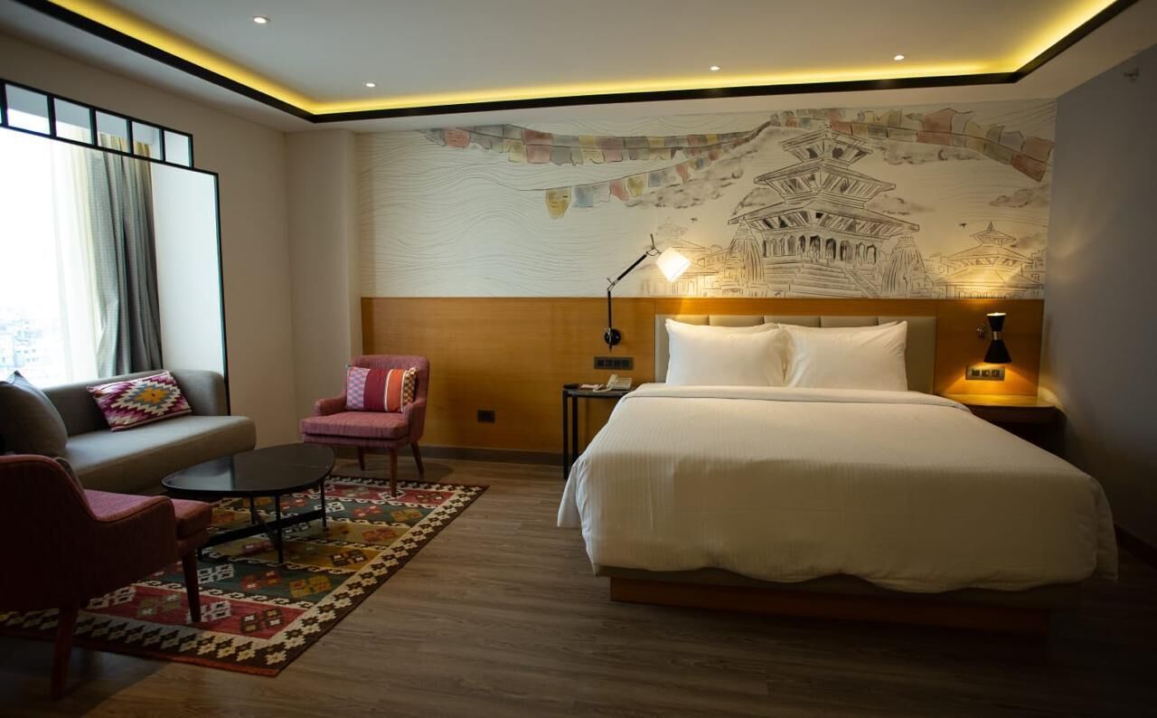 Suite, 1 Double Bed, City View | Minibar, in-room safe, blackout drapes, iron/ironing board