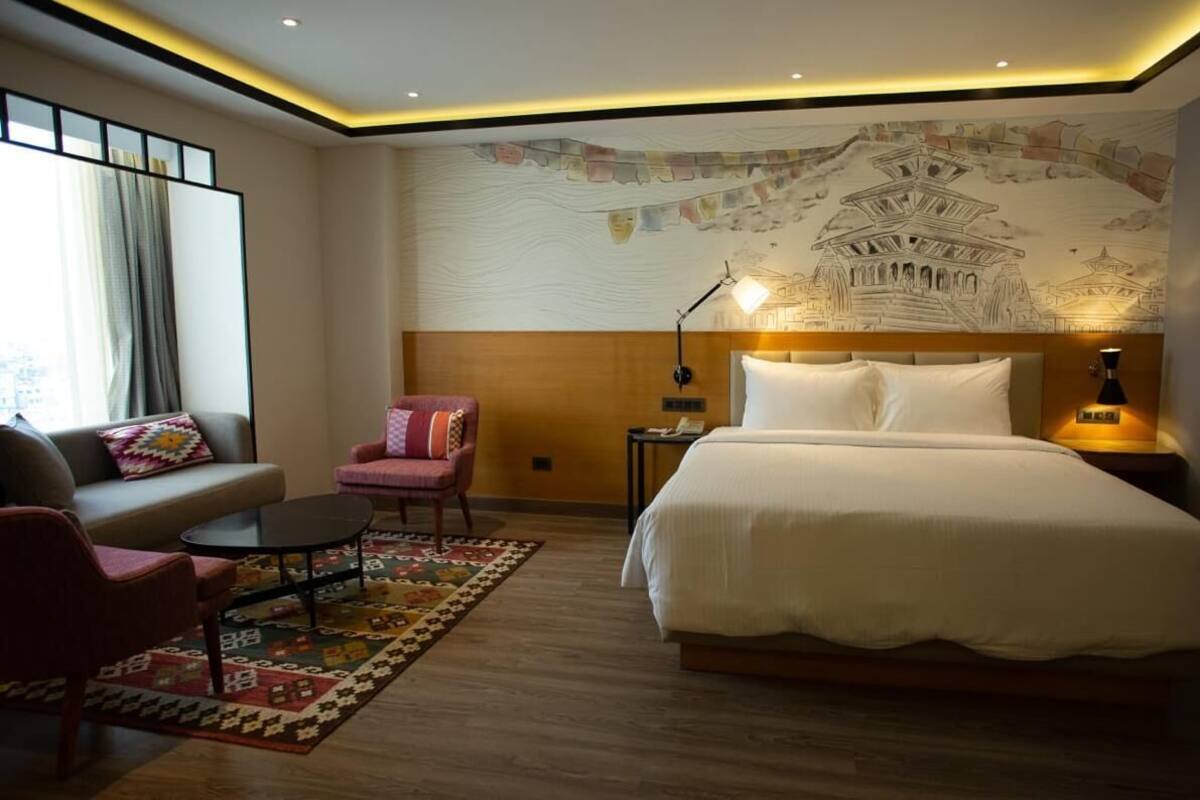 Suite, 1 Double Bed, City View | Minibar, in-room safe, blackout drapes, iron/ironing board