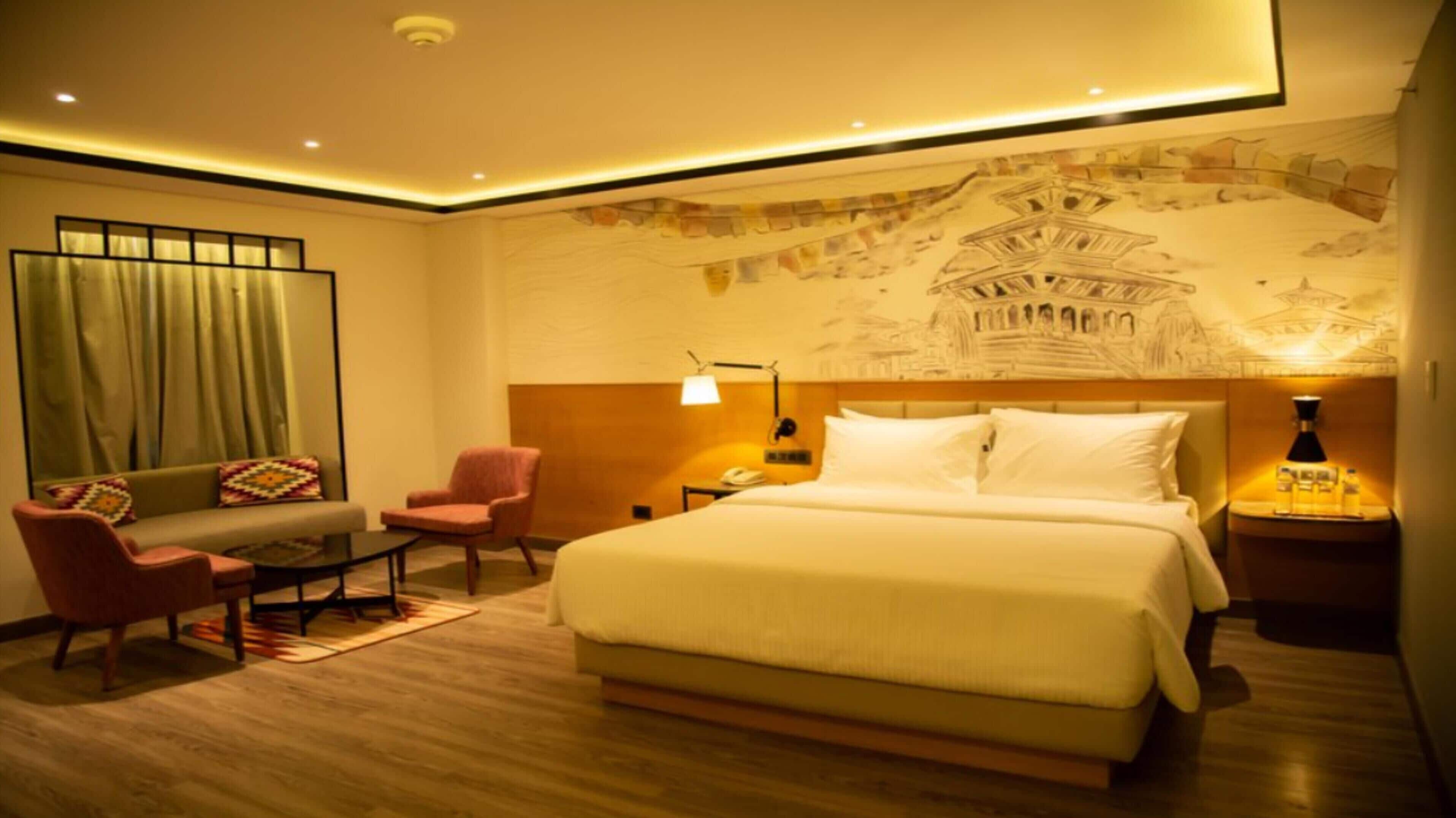 Chambre Premium, 1 lit double | Minibar, coffres-forts dans les chambres, rideaux occultants