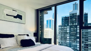 Luxury Double Room, City View | Desk, laptop workspace, blackout drapes, iron/ironing board - Experda  two bedroom Corporate Suites (Melbourne)