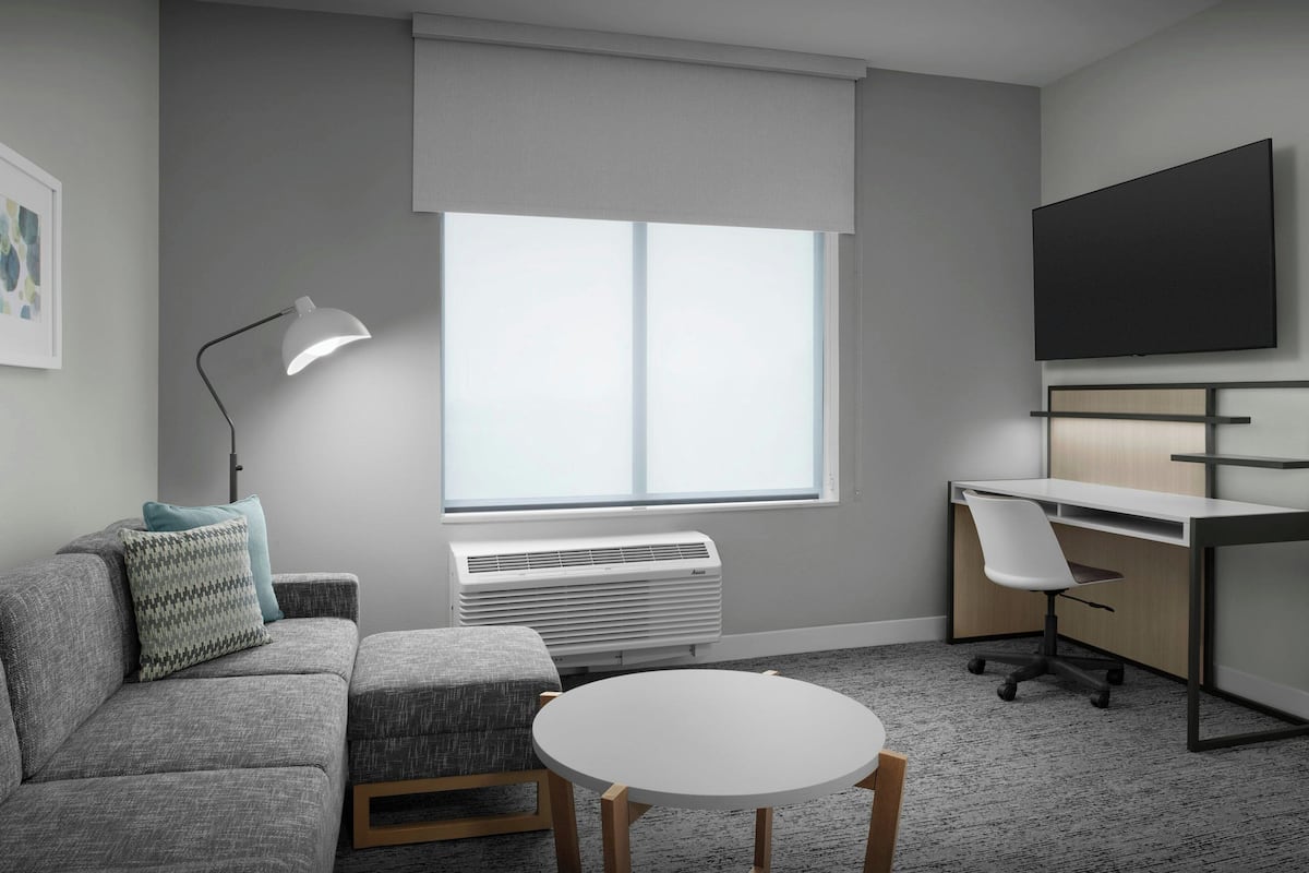 Suite, 1 Bedroom, Non Smoking | Living room | 55-inch flat-screen TV with cable channels