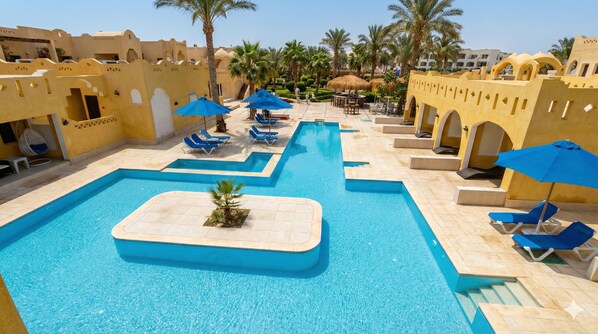 3 outdoor pools, pool umbrellas, pool loungers