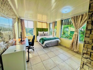 Habitación, 1 habitación, balcón, vista al jardín | 1 habitación 