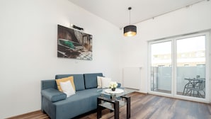 Apartamento, 1 quarto, sacada | Sala de estar