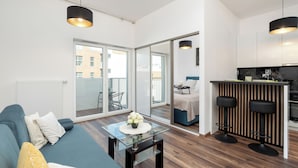 Apartamento, 1 quarto, sacada | Sala de estar
