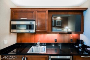 Fridge, microwave, stovetop, coffee/tea maker