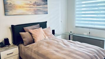 2 dormitorios, tabla de planchar con plancha, wifi y ropa de cama