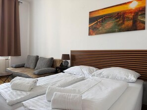 Appartement, 2 slaapkamers | Verduisterende gordijnen, geluiddichte muren