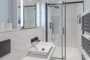 Hair dryer, towels, soap, shampoo