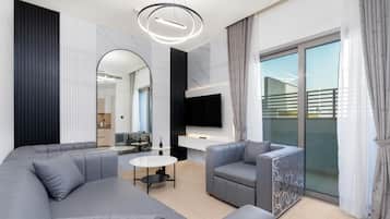 Comfort Apartment, 1 Bedroom, City View | Living area | 55-inch Smart TV with cable channels