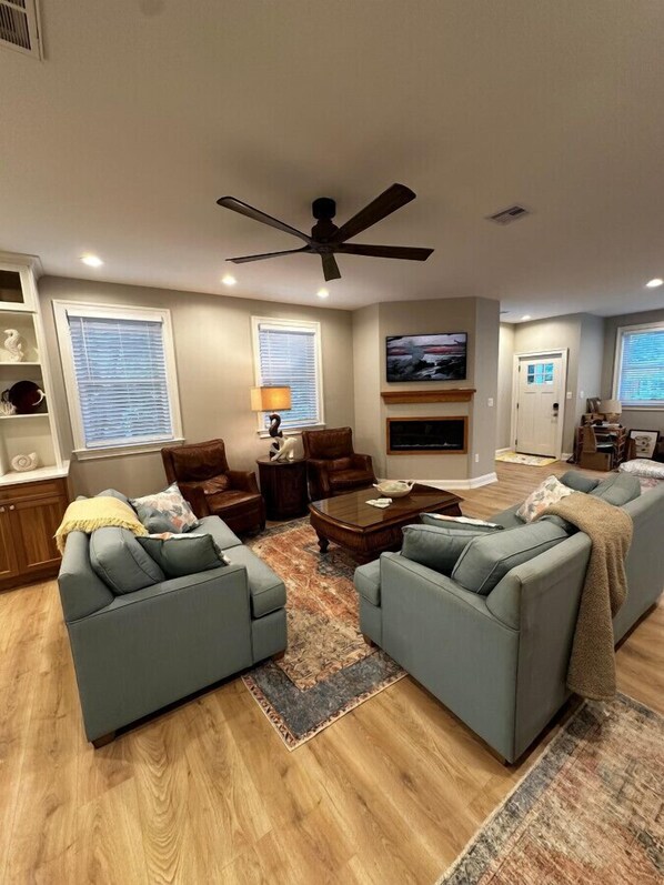 Smart TV, fireplace, books