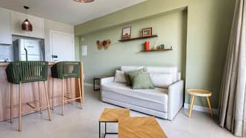 Basic Apartment | Living area | Flat-screen TV