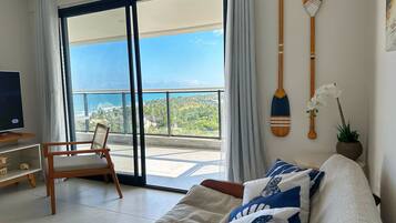 Elite Apartment | Living area | Flat-screen TV