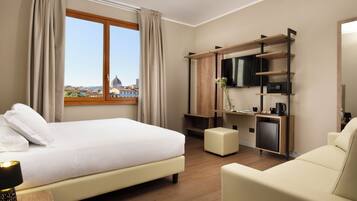 Family Quadruple Room, City View | In-room safe, desk, laptop workspace, blackout drapes