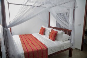 ห้องดีลักซ์, ระเบียง, เห็นวิวทะเลบางส่วน | ตู้นิรภัยในห้องพัก, โต๊ะทำงาน, พื้นที่ทำงานแบบใช้แล็ปท็อป, Wi-Fi ฟรี