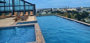 Pool - Luxury 1BR apartment with Airport View and Infinity pool on rooftop. (Accra)