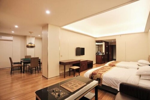 Xinghe Business Hotel