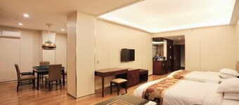 Xinghe Business Hotel