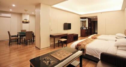 Xinghe Business Hotel