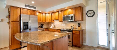 Fridge, stovetop, dishwasher, coffee/tea maker