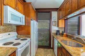 Fridge, oven, stovetop, dishwasher - Kiahuna Plantation Resort 47 Royal Garden 1 BD (Koloa)