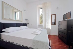 1 chambre, fer et planche à repasser, Wi-Fi gratuit, draps fournis