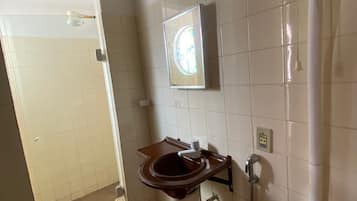 Shower, towels, soap, toilet paper