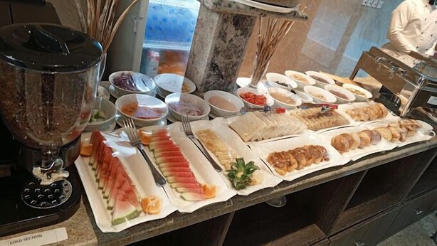 A buffet with various food items and a blender labeled "COLD SECTION". - Schemes Apartment Portharcourt (Port Harcourt)
