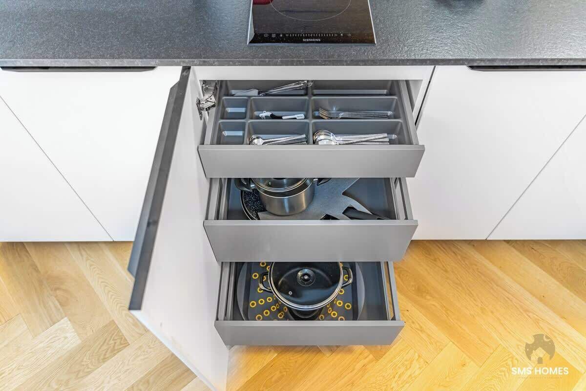 Fridge, stovetop, dishwasher, coffee/tea maker