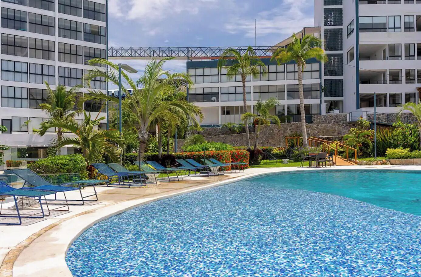 2 outdoor pools, pool umbrellas, pool loungers