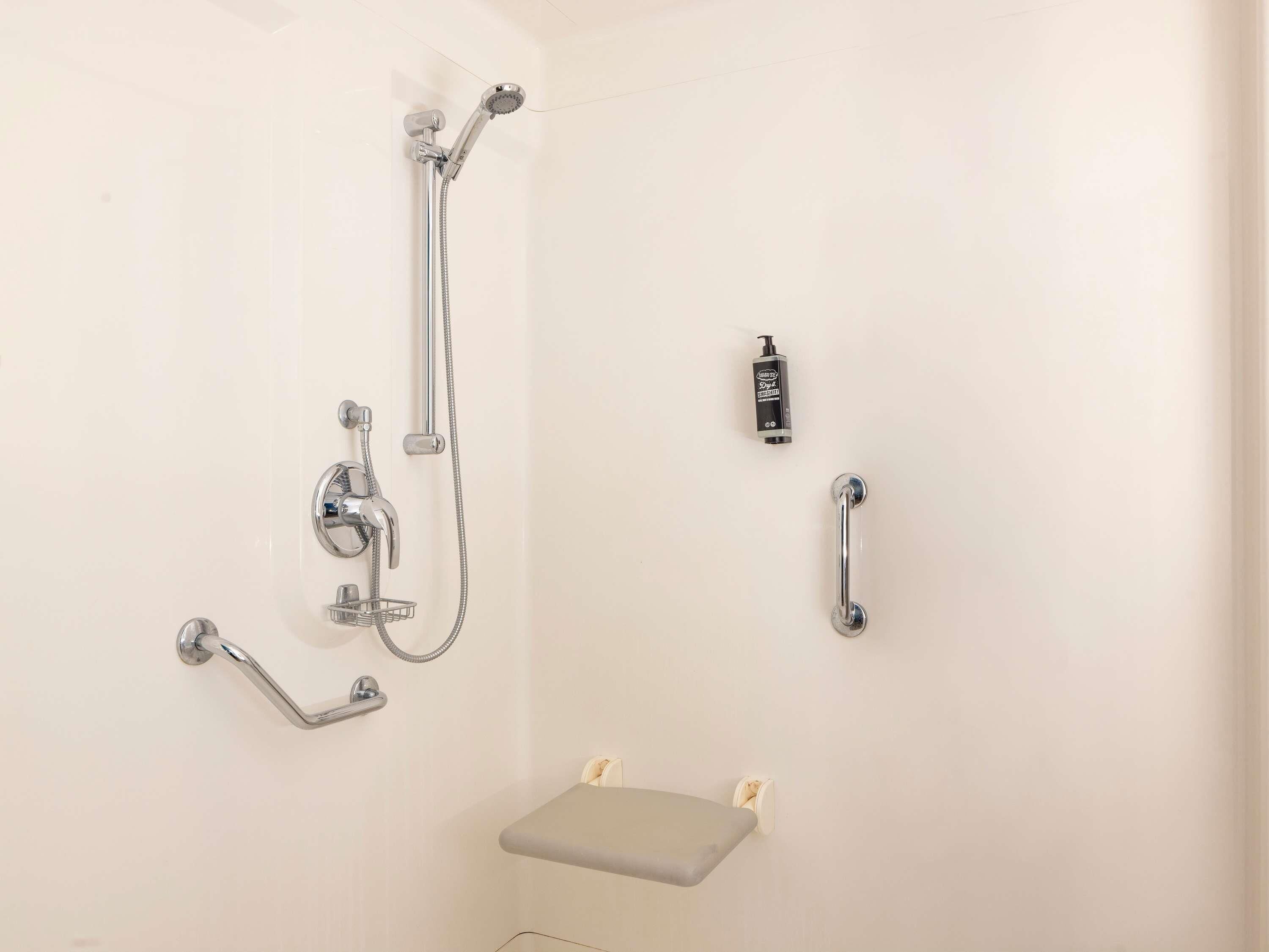 A shower with a handheld showerhead, a handheld showerhead, a handheld showerhead, a handheld showerhead, a handheld showerhead, a handheld showerhead, a handheld showerhead, a handheld showerhead, a handheld showerhead, a handheld showerhead, a handheld showerhead, a handheld showerhead, a handheld showerhead, a handheld showerhead, a handheld showerhead, a handheld showerhead, a handheld showerhead, a handheld showerhead, a handheld showerhead, a handheld showerhead, a handheld showerhead, a handheld showerhead, a handheld showerhead, a handheld showerhead, a handheld showerhead, a handheld showerhead, a handheld showerhead, a handheld showerhead, a handheld showerhead, a handheld showerhead, a handheld showerhead, a handheld showerhead, a handheld showerhead, a handheld showerhead, a handheld showerhead, a handheld showerhead, a handheld showerhead, a handheld showerhead, a handheld showerhead