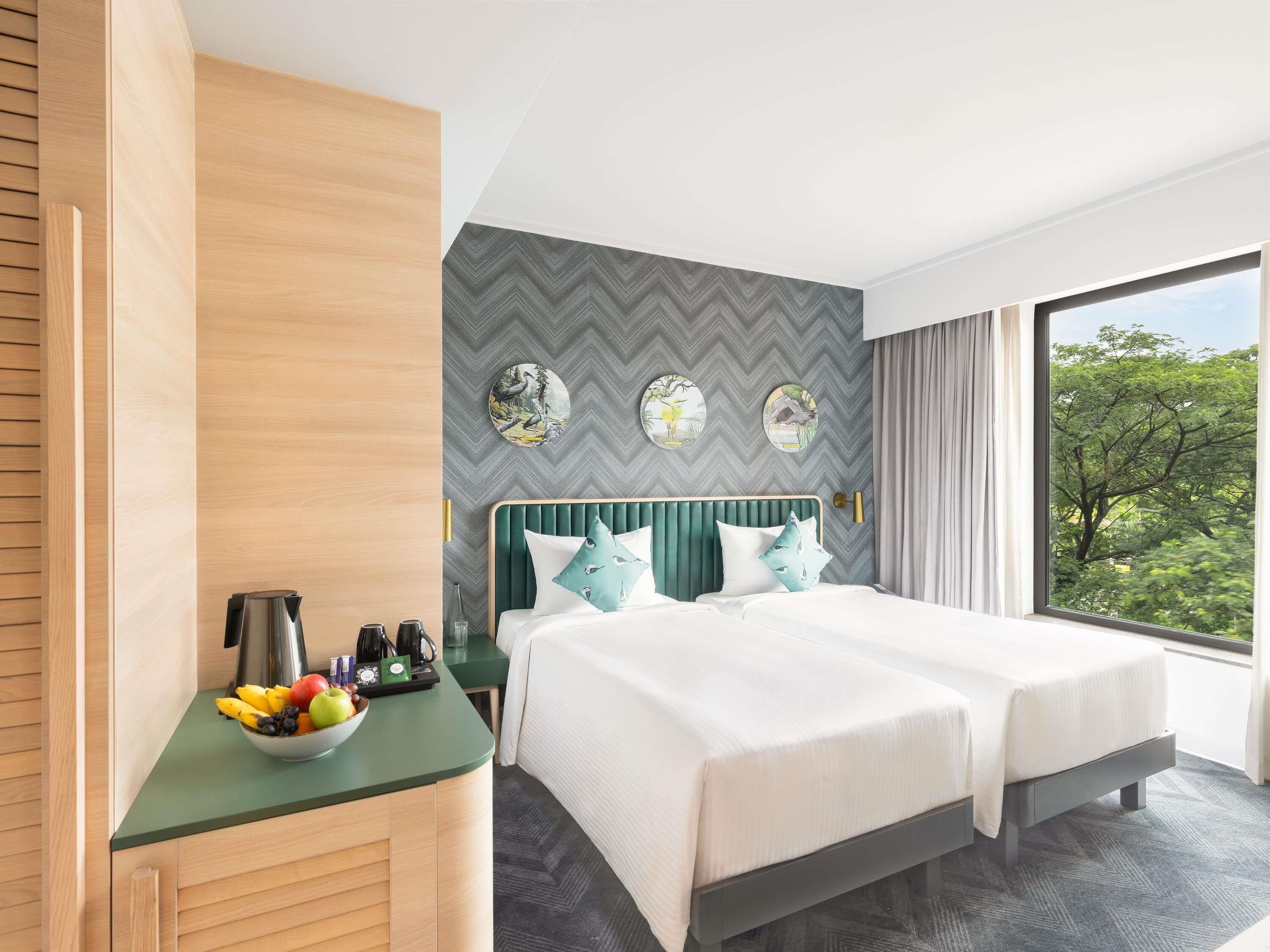 Standardzimmer, 2 Einzelbetten | Minibar, Zimmersafe, individuell eingerichtet, Schreibtisch