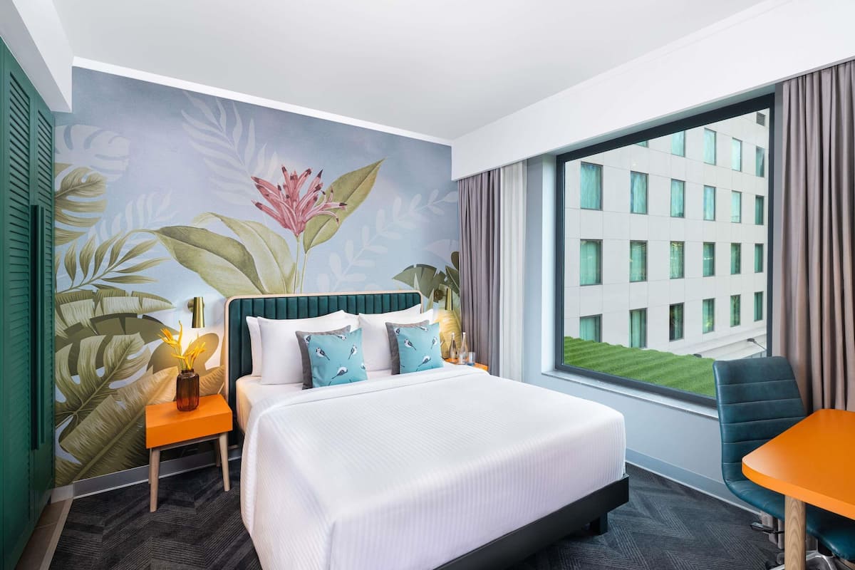 Deluxe Suite, 1 Queen Bed | Minibar, in-room safe, individually furnished, desk