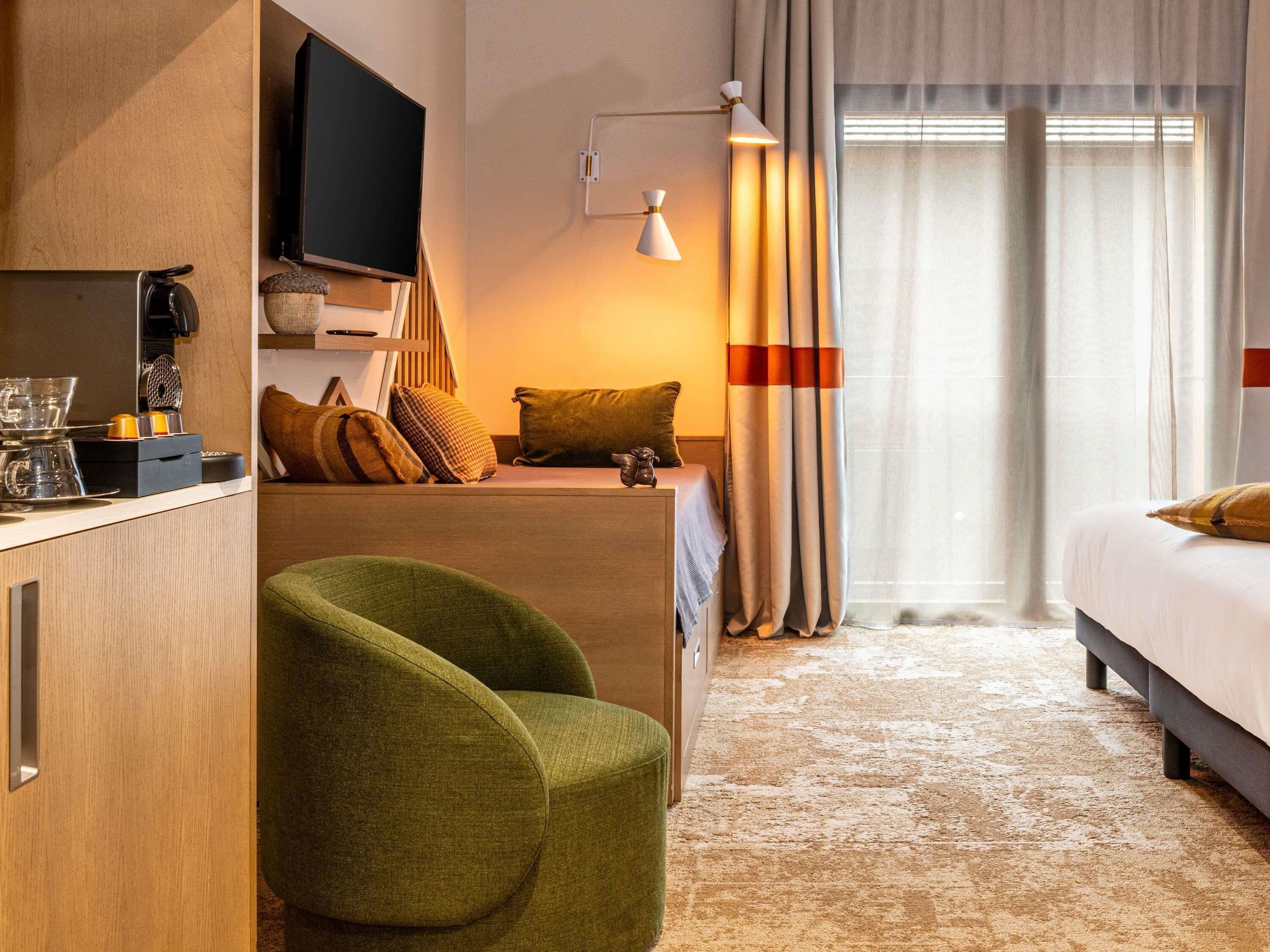 Family Room, Multiple Beds | Minibar, in-room safe, soundproofing, free WiFi
