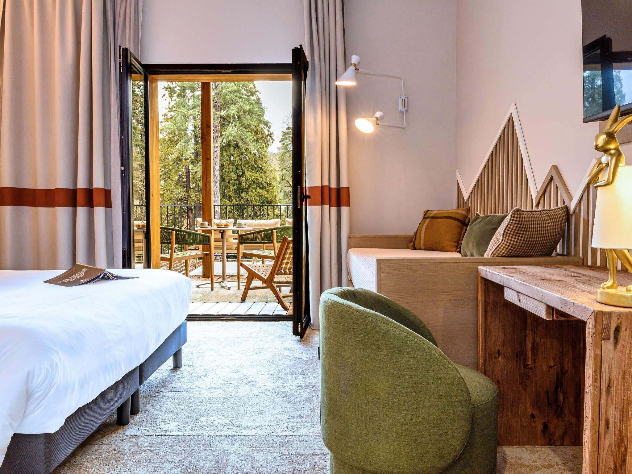 Deluxe Room, Multiple Beds, Terrace, Mountain View | Minibar, in-room safe, soundproofing, free WiFi