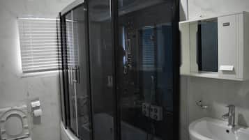 Economy Room, City View | Bathroom | Bathtub, free toiletries, towels, soap