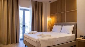 Kamar Triple Deluks | Seprai premium, minibar, Wi-Fi gratis, dan seprai linen
