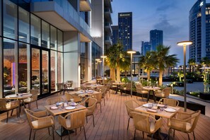 4 restaurants, breakfast, lunch, dinner served; Mediterranean cuisine  - Hilton Bahrain City Centre Hotel & Residences (Manama)