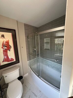 Shower, towels, soap, shampoo