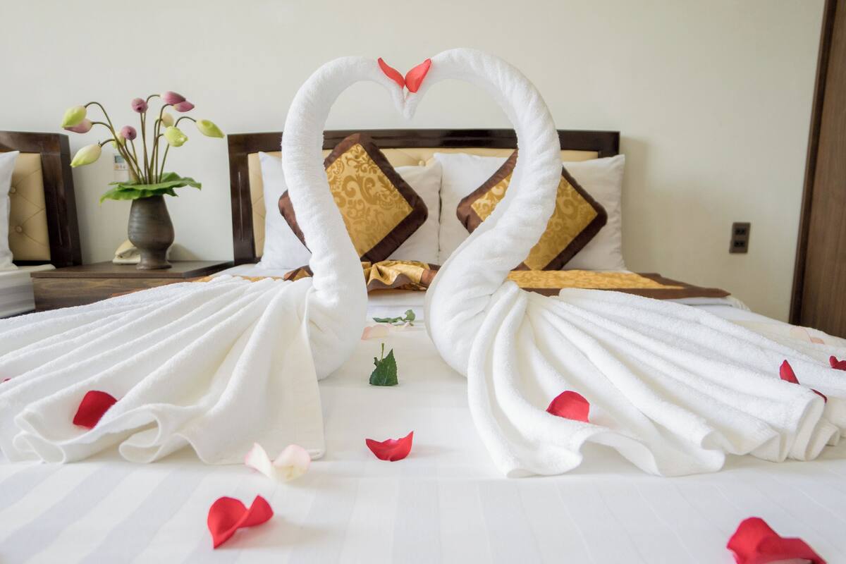 Standard Quadruple Room, Balcony, City View | Desk, laptop workspace, free WiFi