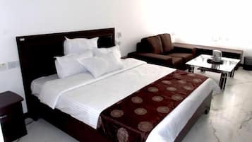 Deluxe Room, Balcony, City View | Desk, laptop workspace, free WiFi