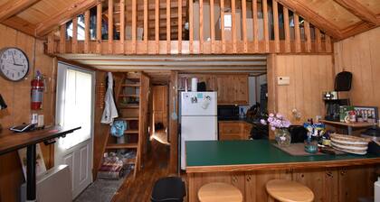 Rustic, cozy lodge available for rent at Plattsburgh RV Park