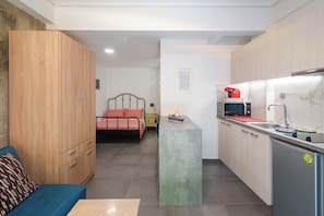 Fridge, microwave, stovetop, coffee/tea maker