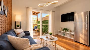 Warm Modern Living Room with Patio Views