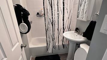 Hair dryer, towels, soap, toilet paper